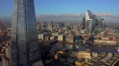 Stunning panoramic view of London city district - with Tower bridge, London railway near by and the Shard skyscraper in the foreground. Beautiful London video.