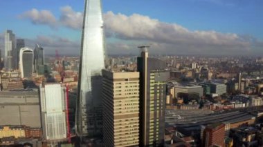 Stunning panoramic view of London city district - with Tower bridge, London railway near by and the Shard skyscraper in the foreground. Beautiful London video.