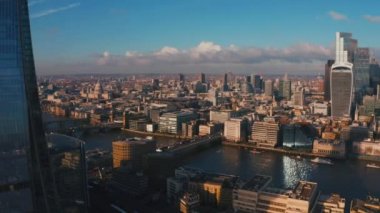 Stunning panoramic view of London city district - with Tower bridge, London railway near by and the Shard skyscraper in the foreground. Beautiful London video.