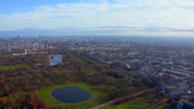 Aerial cinematic view of the London Hyde Park from above. Beautiful cinematic shot.