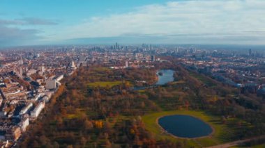 Aerial cinematic view of the London Hyde Park from above. Beautiful cinematic shot.