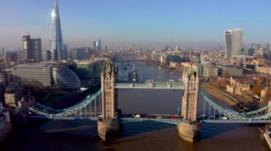 Establishing Aerial View of the Tower Bridge, Shard Skyscraper and London Skyline