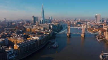 Establishing Aerial View of the Tower Bridge, Shard Skyscraper and London Skyline
