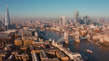 Establishing Aerial View of the Tower Bridge, Shard Skyscraper and London Skyline