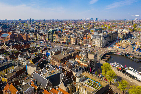 Panoramic aerial view of Amsterdam during beautiful summer day, The Netherlands near classical cathedral.