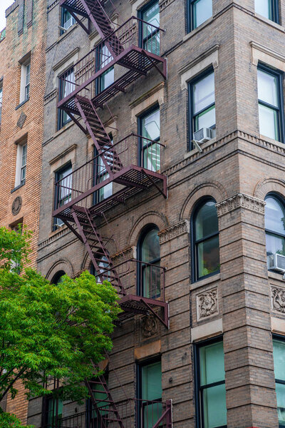 New York City, USA - May 30, 2019: Corner of Bedford Street with Grove Street in Greenwich Village, featured in Friends the famous American Television sitcom
