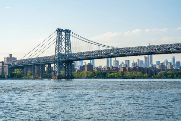 Williamsburg  bridge view from the Domino park sign in Williamsburg, New York.