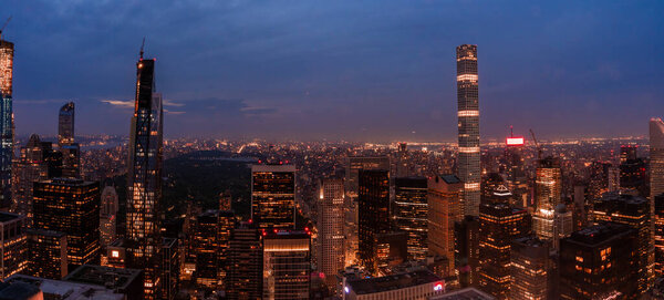 New York City night skyline with cityscape and skyscrapers in Manhattan
