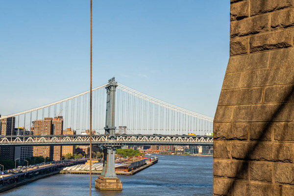 Close up view of the Manhattan bridge from the Brooklyn bridge