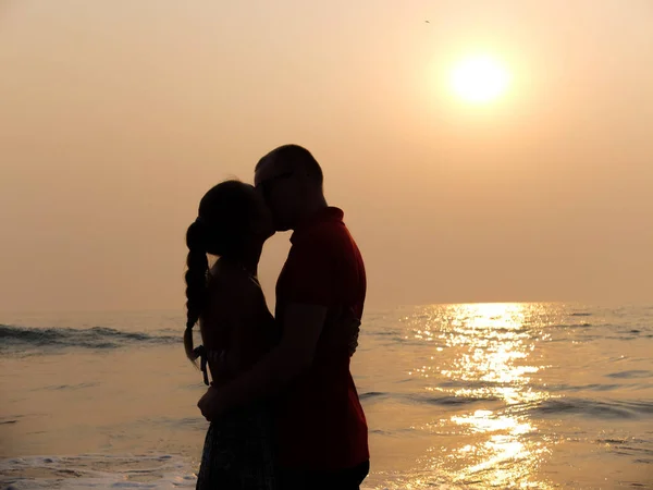 Kissing Lovers on the beach Stock Photo