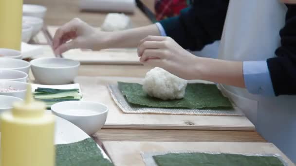Children make sushi Stock Video