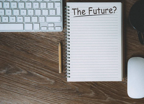 A desk with a notebook and computer with the business planning for the future with copy space