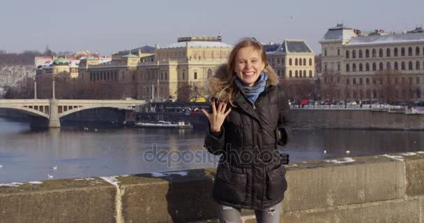 Engagement ring. Woman on the charles bridge showing ring after marriage proposal. Excited cute girl. RED EPIC. slow motiom — Stock Video