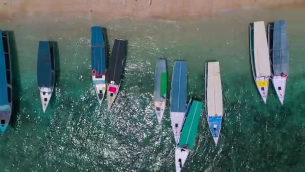 Top aerial view of yachts in blue lagoon at sunny day. — Stock Video
