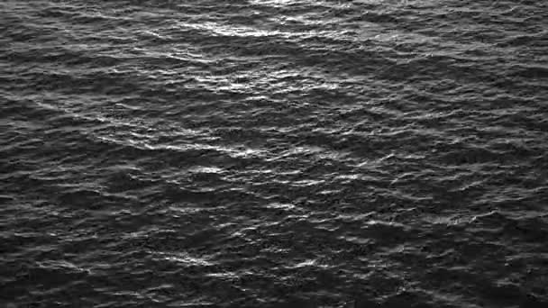 Black and white surface of sea or ocean water. — Stock Video