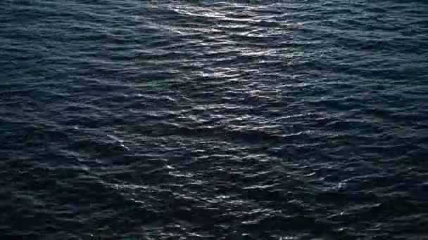 Top view of beautiful golden color sunset ocean water surface. Blinking sea backdrop. — Stock Video