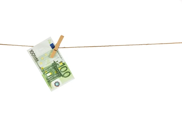 100 Euro banknote hanging on clothesline on white background. — Stock Photo, Image