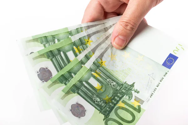 Female hand holding 100 euro banknotes — Stock Photo, Image