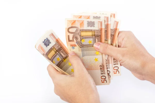 Mano femenina con 50 billetes en euros — Foto de Stock