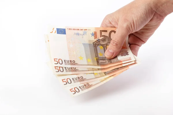 Mano femenina con 50 billetes en euros — Foto de Stock