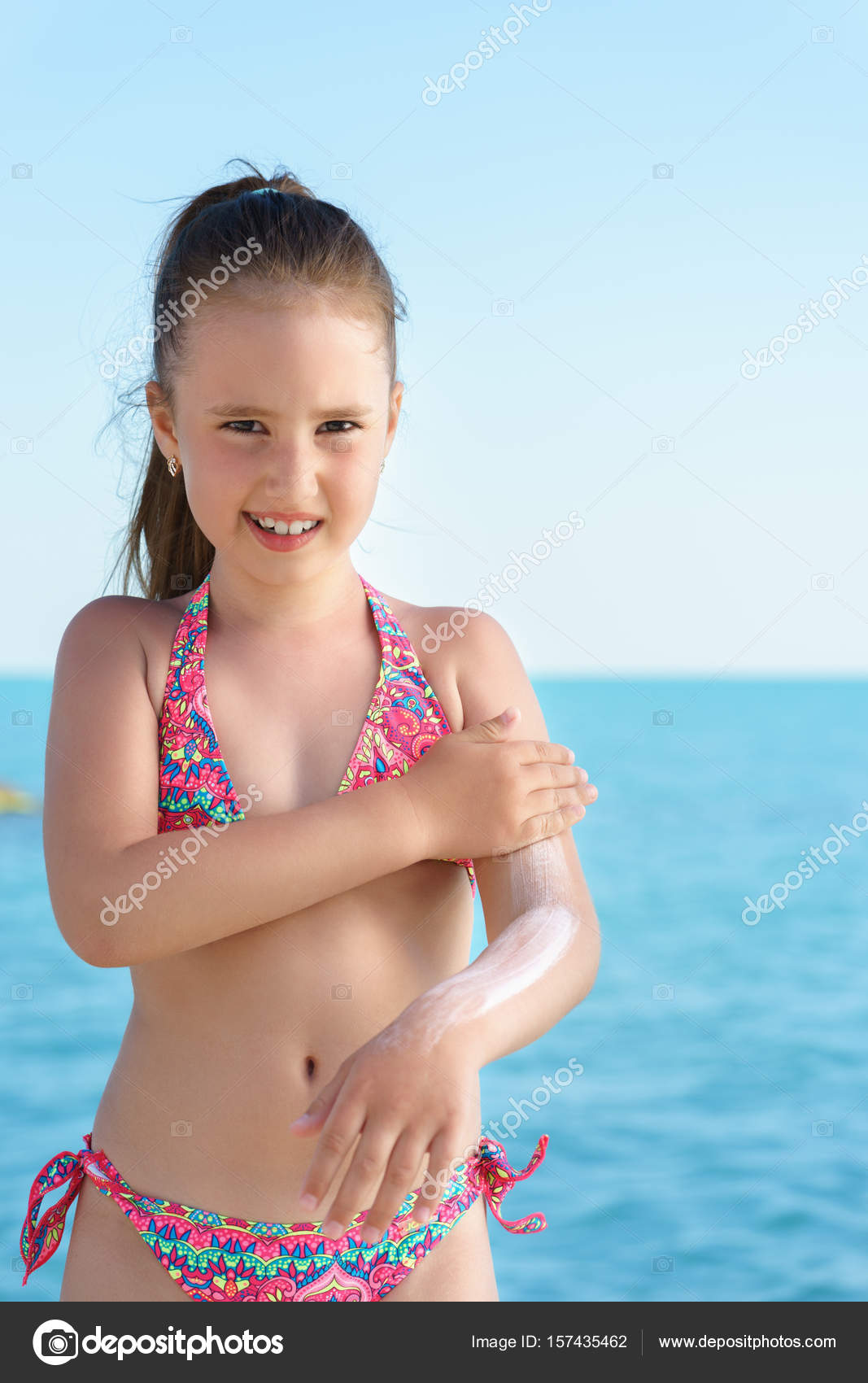 Young Girl On The Beach