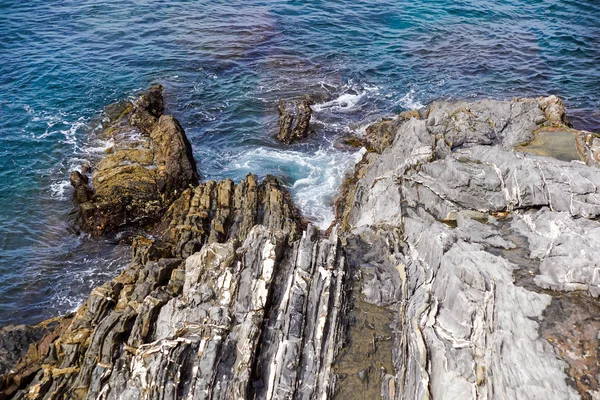 Sea landscape. Evening on the stone beach.