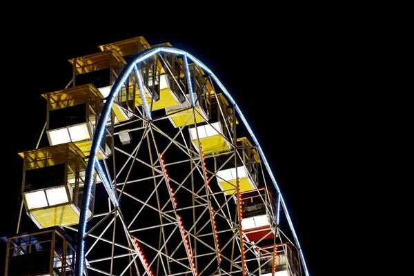 Detail of a night-time panorama wheel lit by lights — Stock Photo, Image