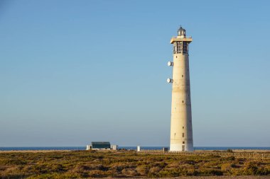 Deniz feneri Morro Jable Beach Jandia Yarımadası gündoğumu ışık, Fuerteventura, Kanarya Adaları, İspanya