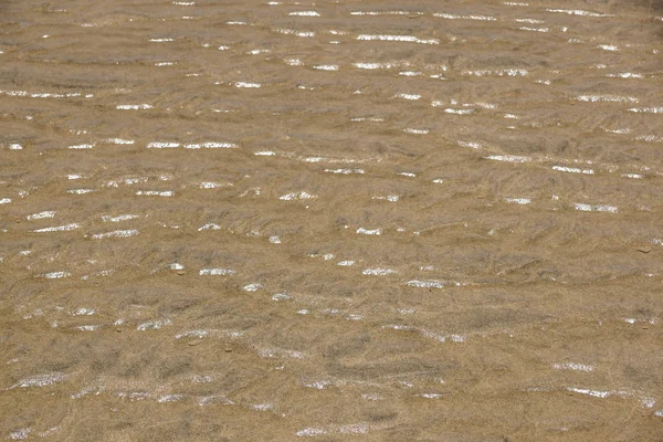 Ola suave del mar en la playa de arena — Foto de Stock