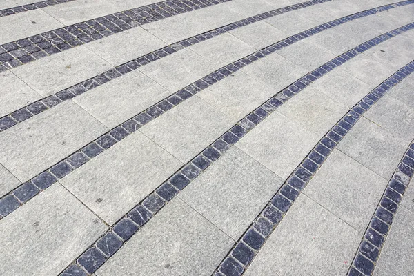 Textura do pavimento de pedra. Granito calhau apedrejado fundo pavimento. Fundo abstrato do pavimento de paralelepípedos — Fotografia de Stock