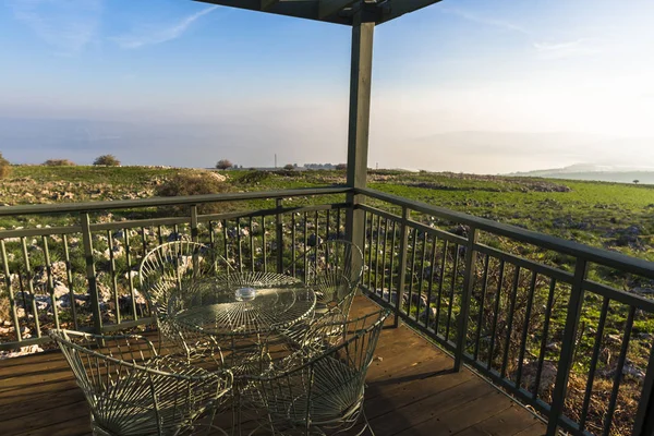 The view of the sunset from the wooden deck — Stock Photo, Image