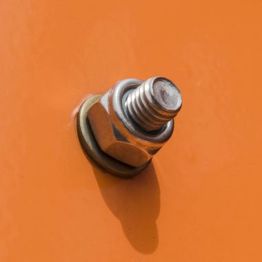 Bolt and nut of shiny metal clipart