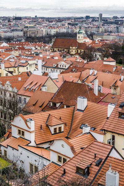 The morning fog over the red tiled roofs of one of Prague's oldest neighbourhoods.