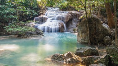 Cool streams of Erawan mountain waterfall in Kanchanaburi province in Western Thailand
