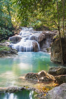 Cool streams of Erawan mountain waterfall in Kanchanaburi province in Western Thailand