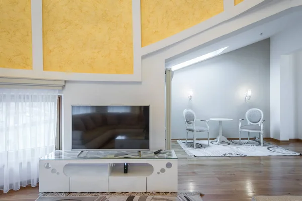 Living room interior in loft apartment, in the attic — Stock Photo, Image