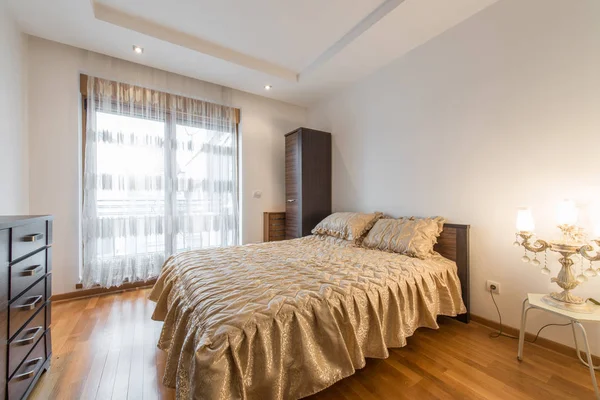 Interior of a luxury loft bedroom with master bed