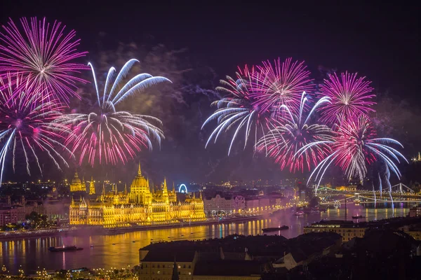 Budapest, Hungary - The beautiful 20th of August fireworks over the river Danube on St. Stephens day or foundation day of Hungary. This view includes the Hungarian Parliament, Liberty Statue, Gellert Hill, Citadell and the Szechenyi Chain Bridge