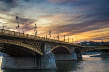 Budapest, Hungary - The beautiful Margaret Bridge at sunset with amazing colorful sky clipart