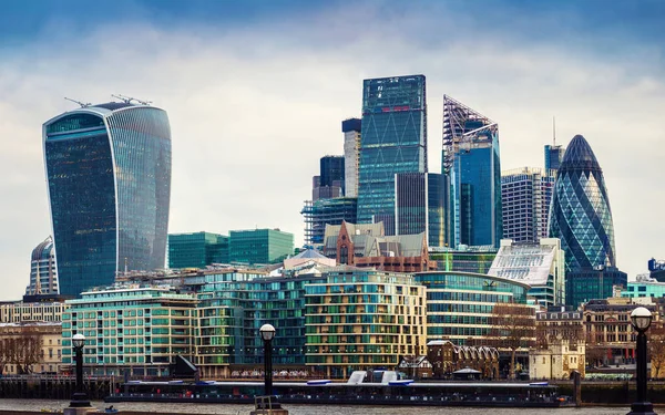 London, England - Panoramic view of Bank, London 's leading financial district with blue sky and clouds — стоковое фото