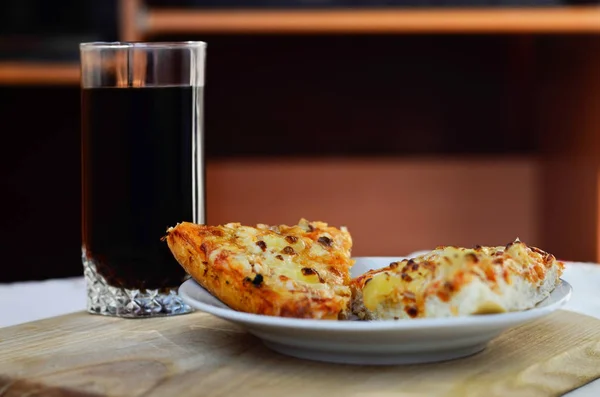 Hot pizza and cup of cola