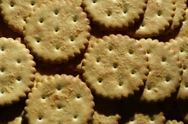 Closeup arka plan çok tuzlu kraker yuvarlak