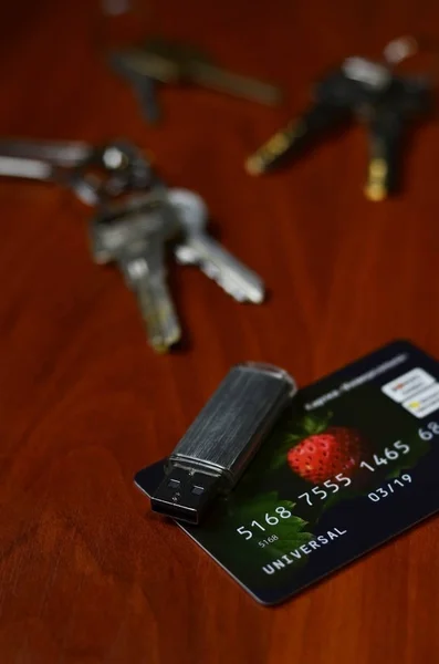 Credit card, memory card and keys - Online security or real estate concept