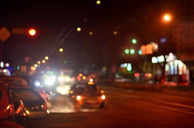 Sanatsal stil - ufuk kentsel soyut doku, şehir ışıkları gece, vintage veya retro renk tonu, sokakta arabadan bokeh ile arka plan bulanık