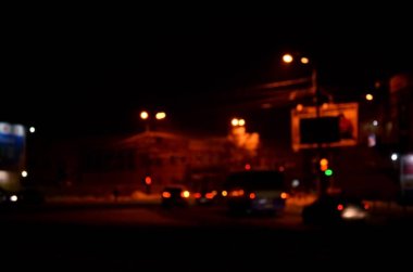 Sanatsal stil - ufuk kentsel soyut doku, şehir ışıkları gece, vintage veya retro renk tonu, sokakta arabadan bokeh ile arka plan bulanık