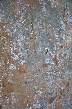 Paslı metal doku çizilmiş yüzeyli. Eski soyulması boya ile metal duvar boyalı. Doku eski boya metal çit yakın çekim