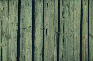 Yıpranmış ahşap duvarın dokusu. Yaslı tahta çitler düz tahtalar..