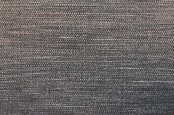 Detailní textury tmavé džínové látky — Stock fotografie