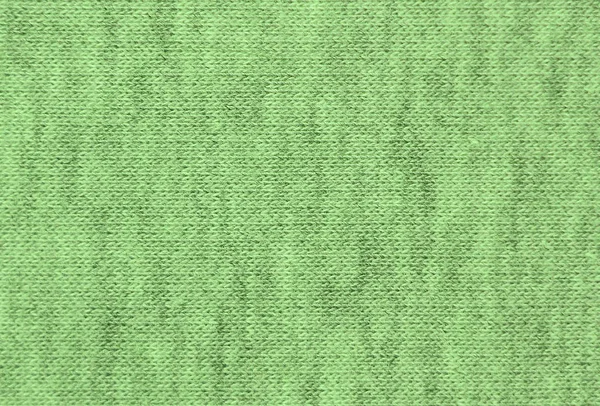 Close-up of heater and knitted jersey fabric textured cloth background with delicate striped pattern