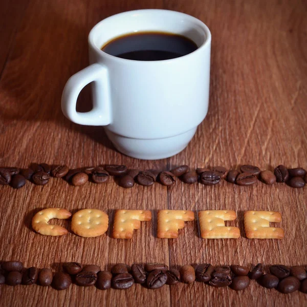 Angol szó "Kávé" készült sós cracker betűk — Stock Fotó